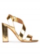 Gold strappy high block heel sandals in mirrored leather