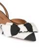 Bow detailed point-toe flats in black and white fabric