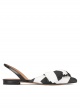 Bow detailed point-toe flats in black and white fabric