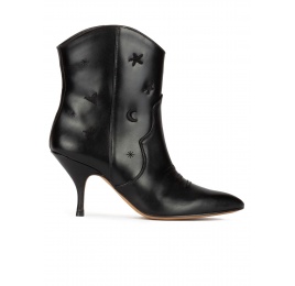 Botines cowboy de tacón medio curvo en piel color negro Pura López
