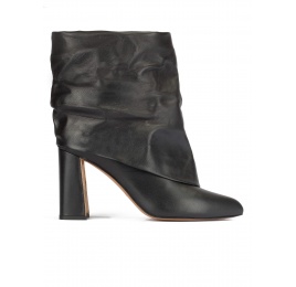 Black leather slouch high block heel ankle boots Pura López
