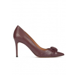 Knot-embellished high heel pumps in burgundy leather Pura López