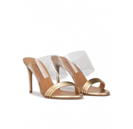 High heel mules in gold leather and transparent vinyl Pura López