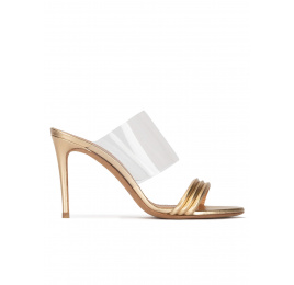 High heel mules in gold leather and transparent vinyl Pura López
