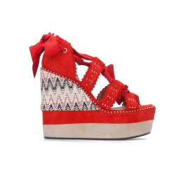 Red high wedge sandals with printed wedge Pura López