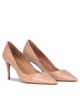 Pointed toe mid-heeled pumps in nude patent leather