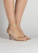 Ankle strap mid stiletto heel sandals in gold leather