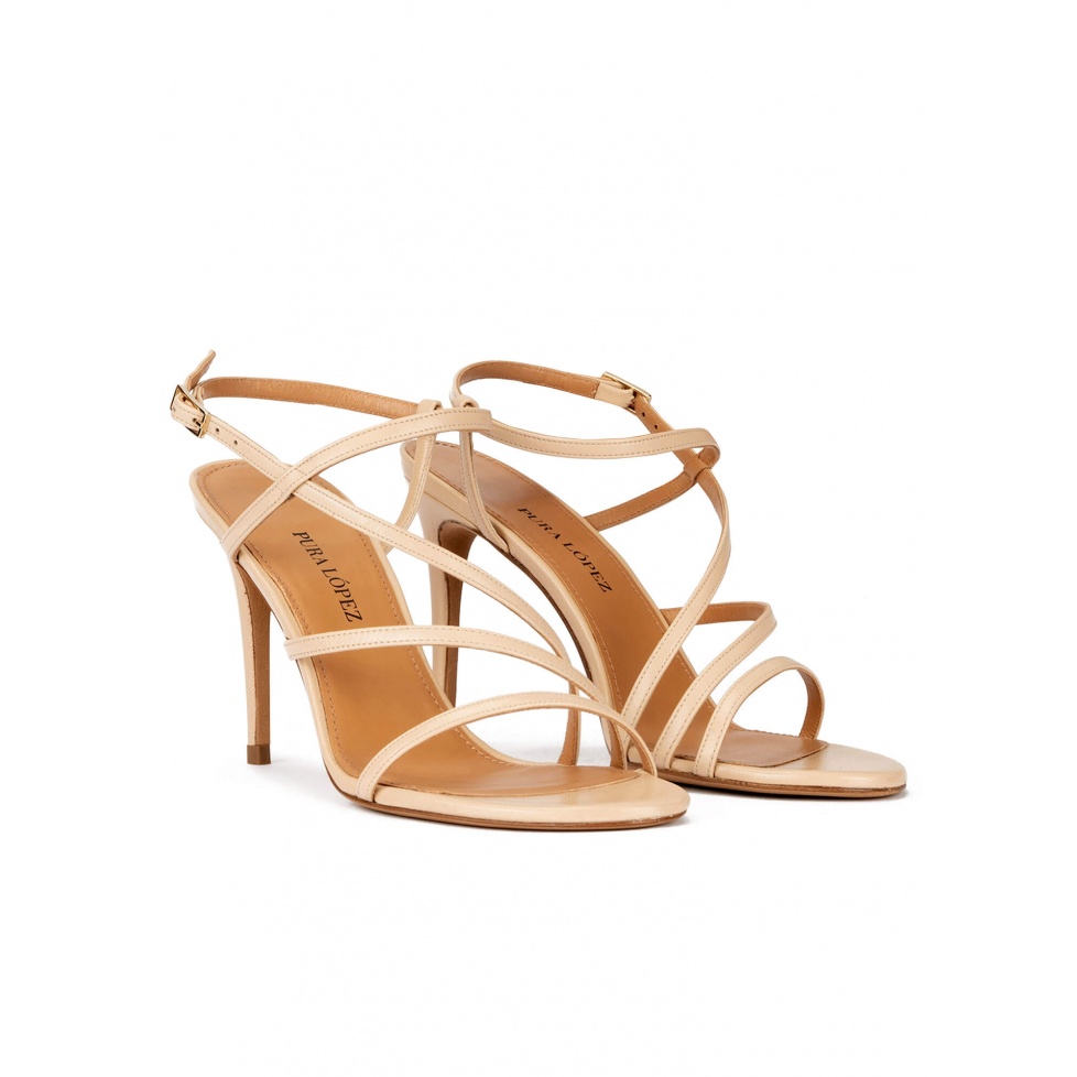 Strappy high-heeled sandals in beige leather