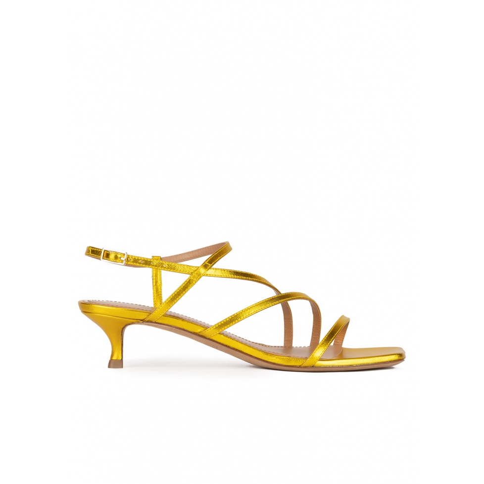 Yellow strappy mid heel sandals in metallic leather