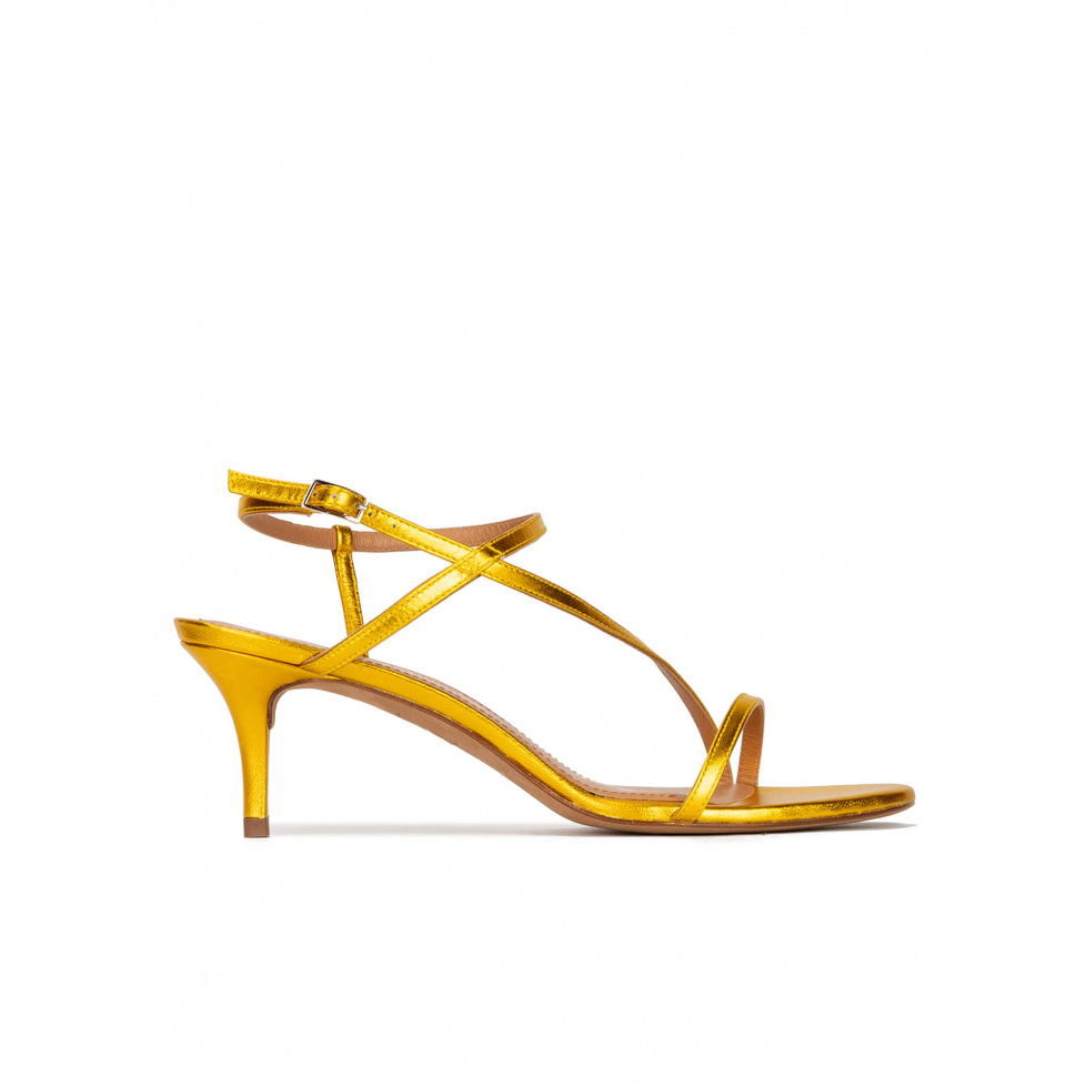 Strappy mid-heeled sandals in yellow metallic leather