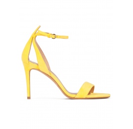 Barely there ankle strap high-heeled sandals in yellow suede Pura López