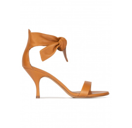 Mid heel sandals in camel leather with knotted ankle strap Pura López