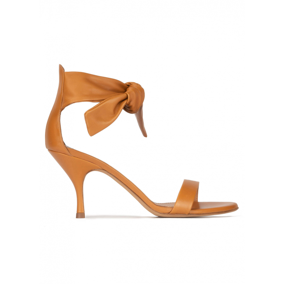 Mid heel sandals in camel leather with knotted ankle strap