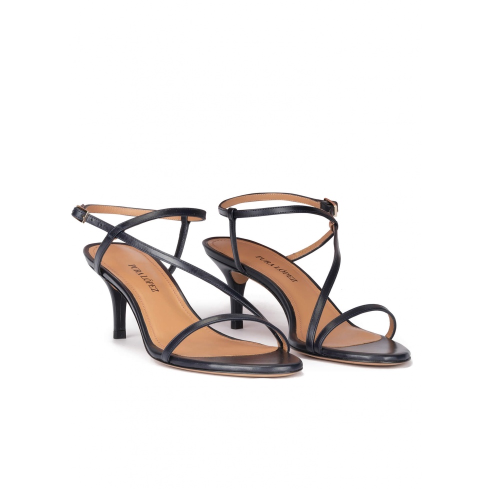 Strappy mid heel sandals in navy blue leather