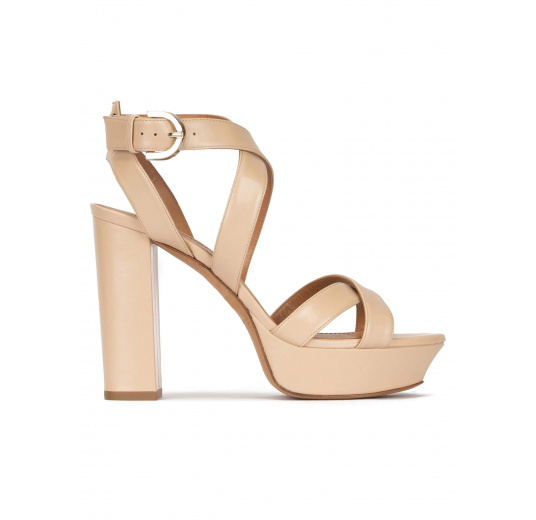 Strappy high platform sandals in beige leather Pura López