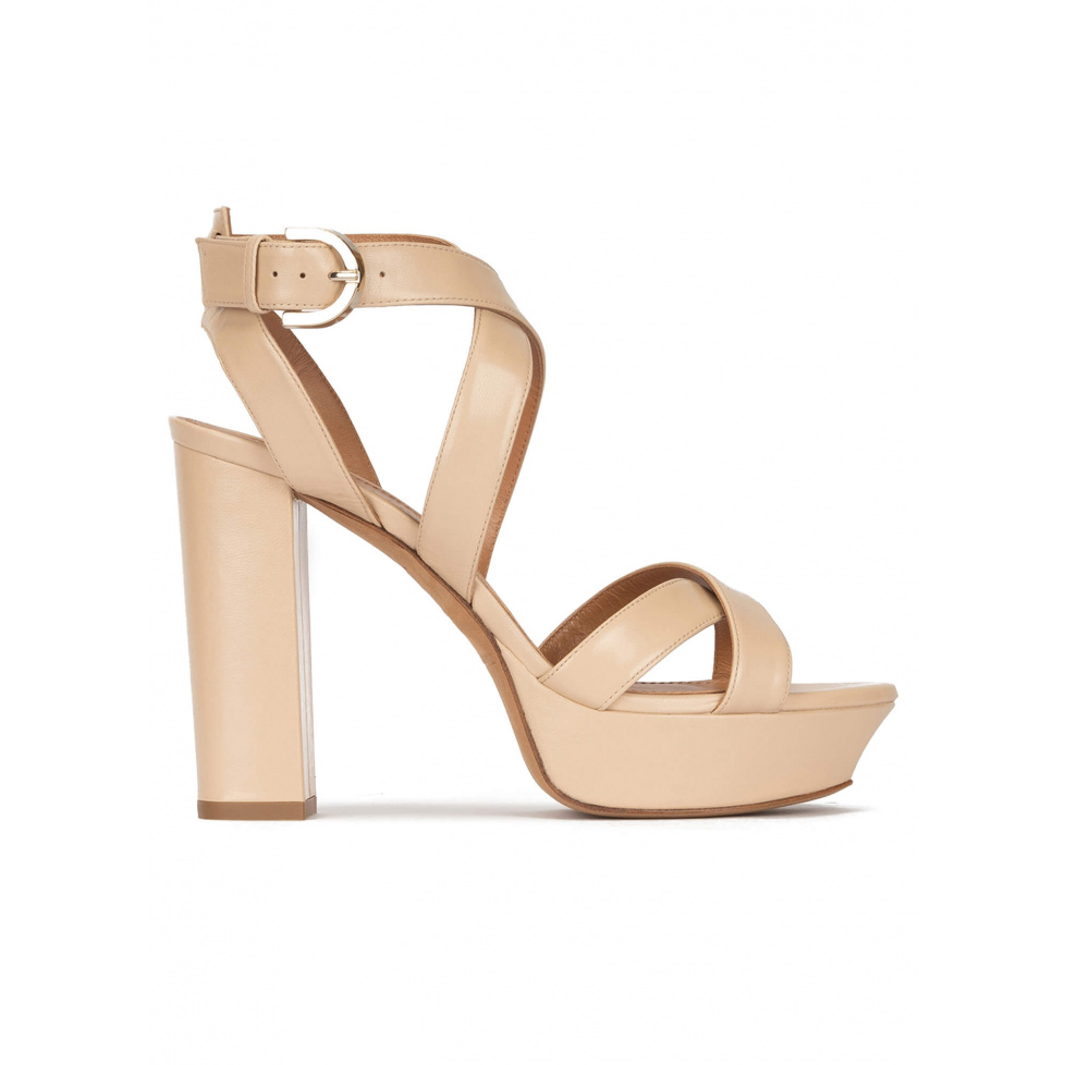 Strappy high platform sandals in beige leather