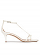 Ankle strap mid heel sandals in off-white leather