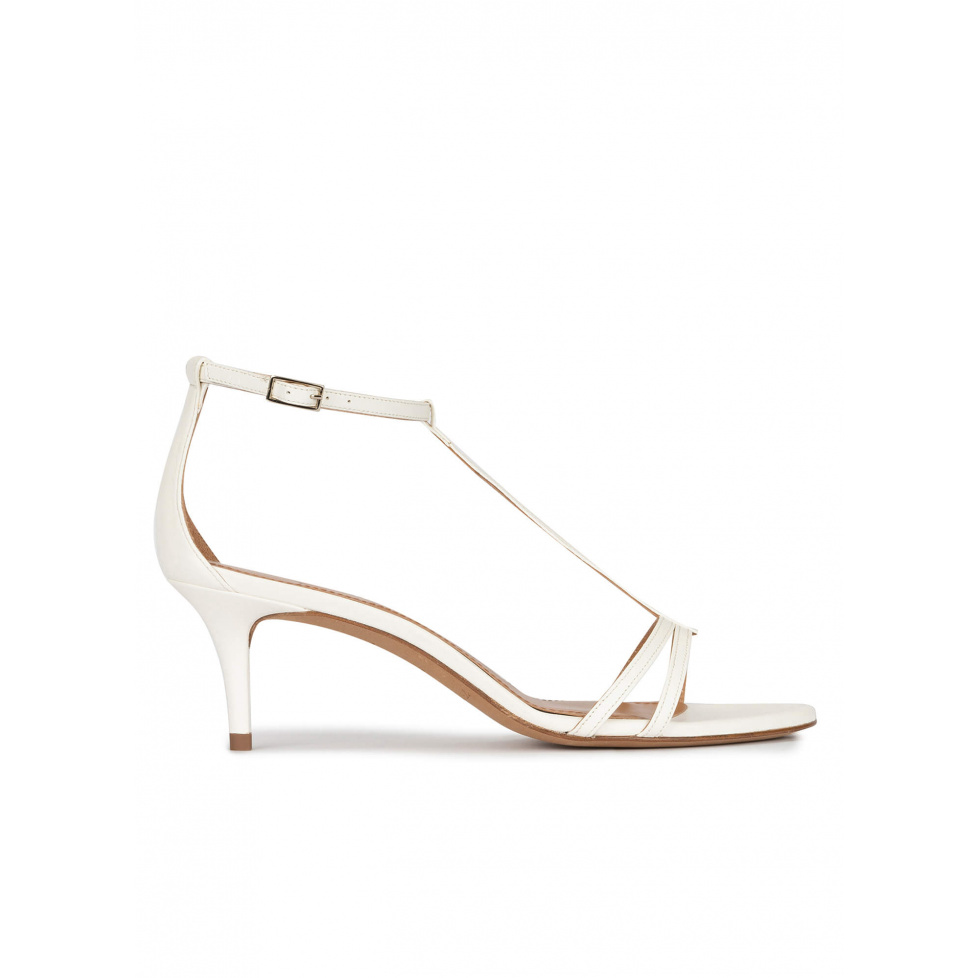 Ankle strap mid heel sandals in off-white leather