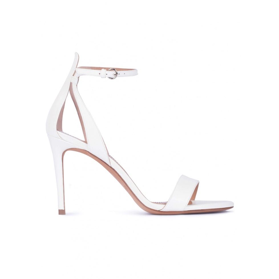 Ankle strap high heel sandals in off-white leather