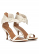 Mid heel sandals in off-white leather