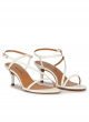 Strappy mid heeled sandals in off-white leather