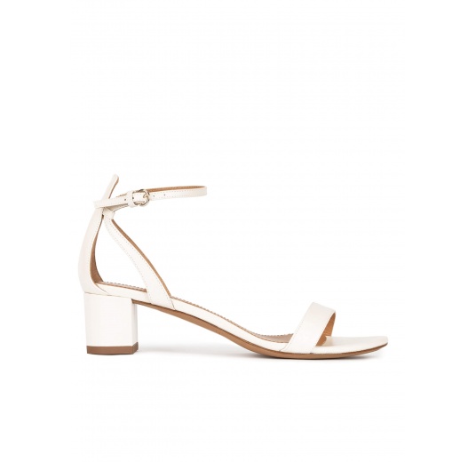 Ankle strap mid block heel sandals in offwhite leather Pura López