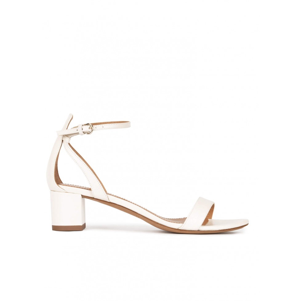 Ankle strap mid block heel sandals in offwhite leather