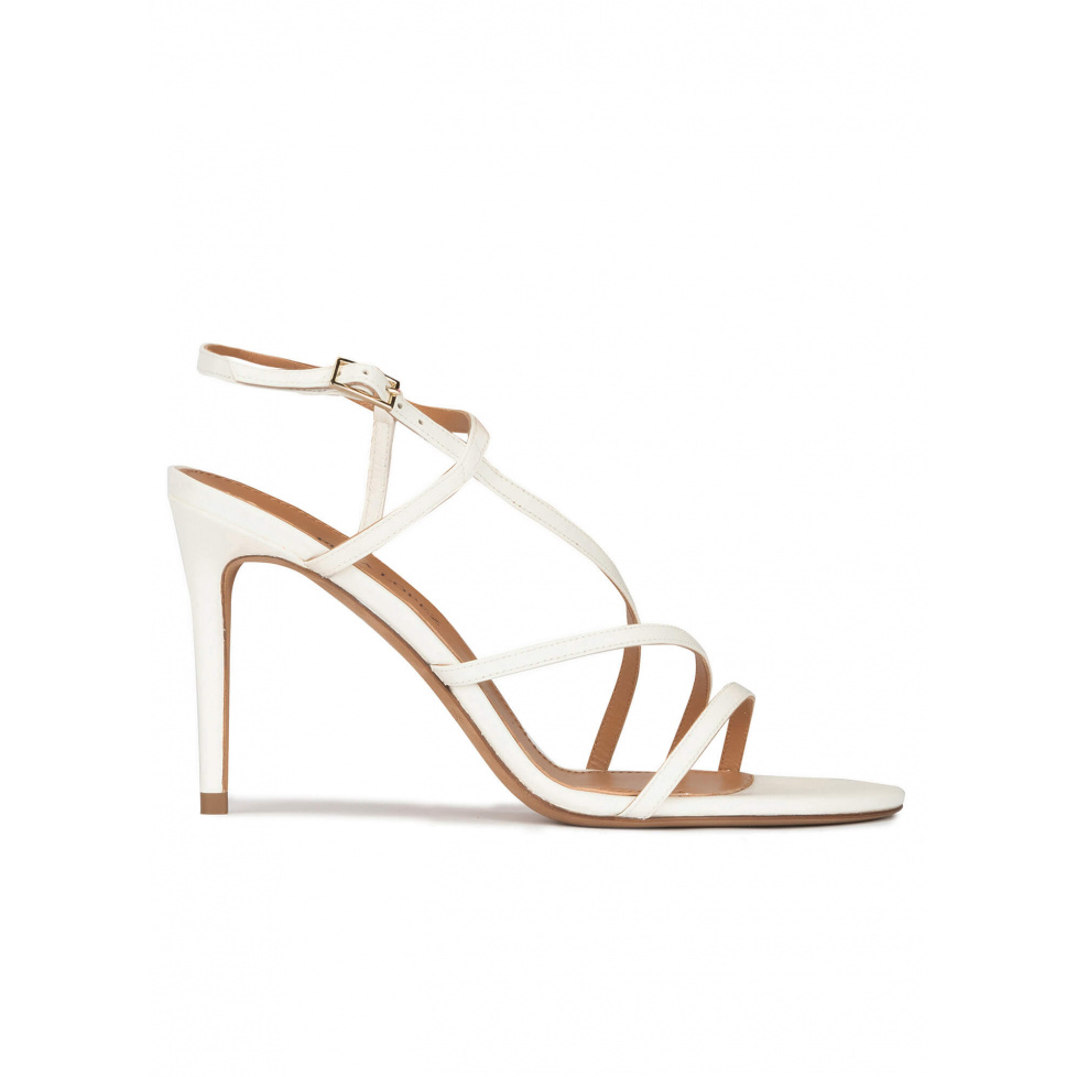 Strappy stiletto heel sandals in off-white leather