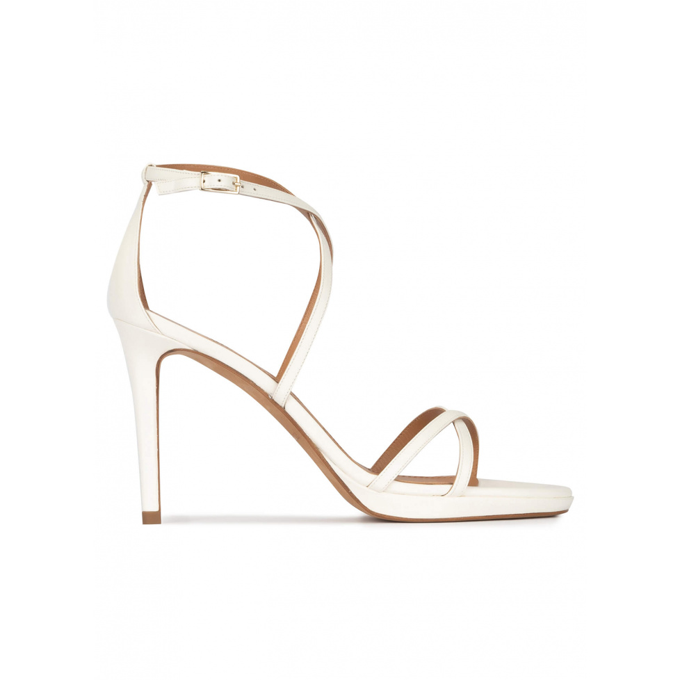 Platform stiletto heel sandals in off-white leather