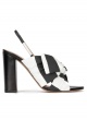 Bow detailed high block heel sandals in black and white