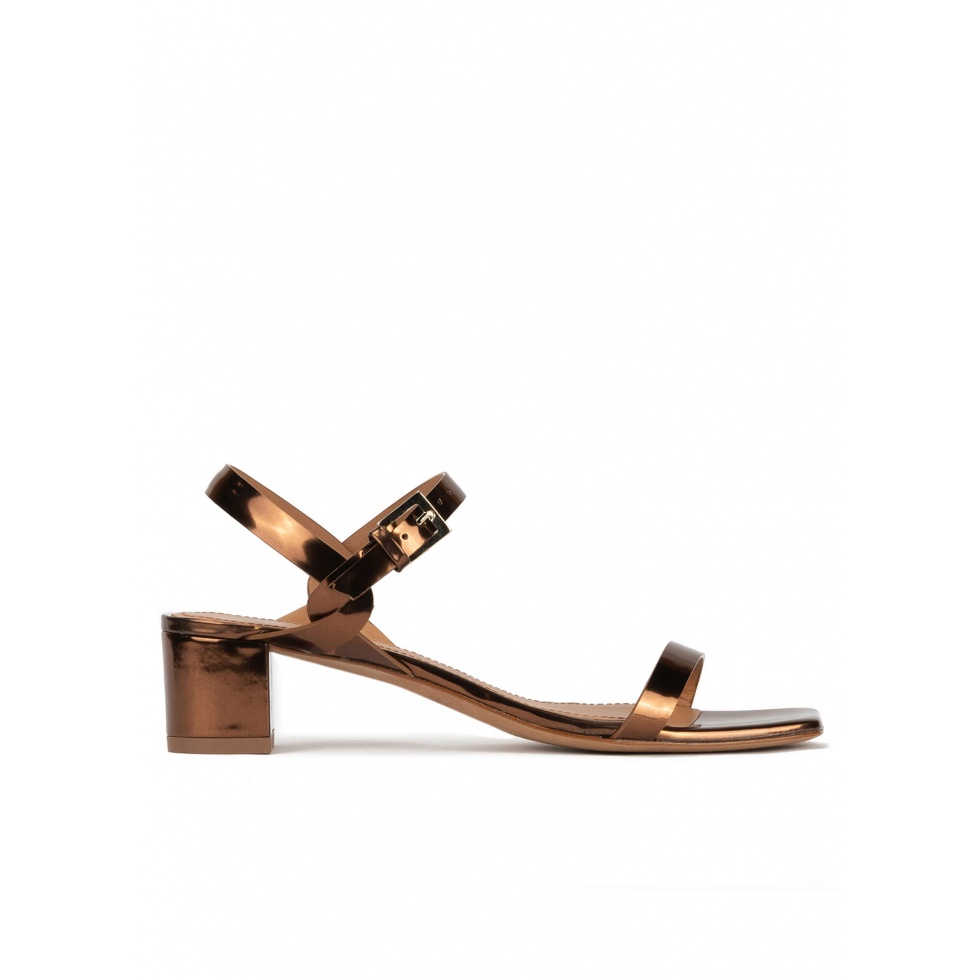 Bronze mid block heel sandals in metallic leather