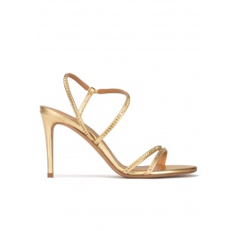 High stiletto heel sandals in gold leather Pura López