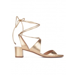 Lace-up strappy mid heeled sandals in gold metallic leather Pura López