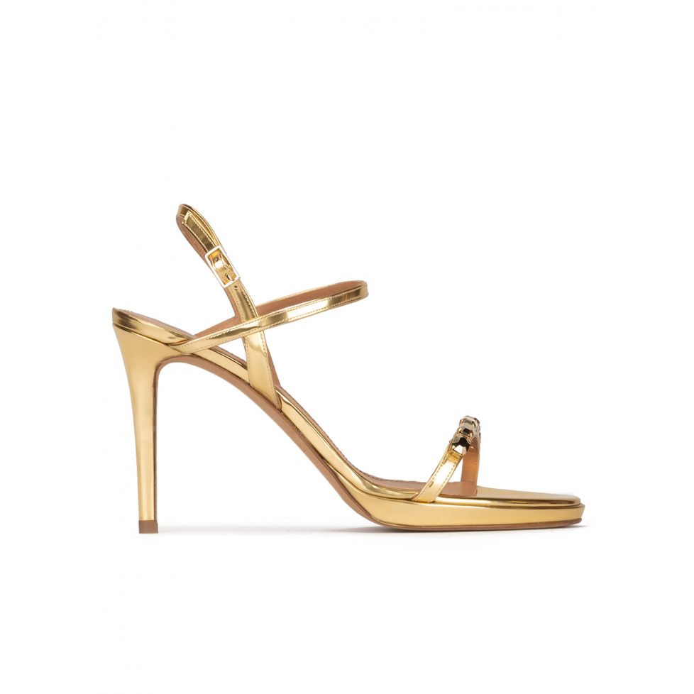 Crystal embellished platform high heel sandals in gold leather