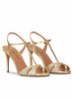 Gold high heel sandals in glitter and metallic leather