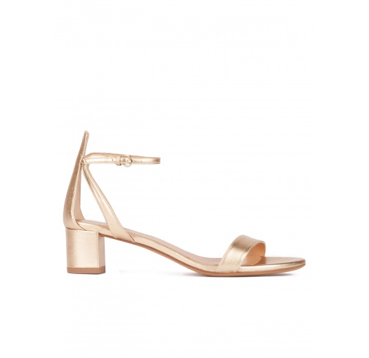 Strappy mid block heel sandals in gold metallic leather Pura López