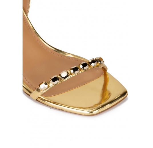 Crystal-embellished mid heel sandals in gold metallic leather Pura López
