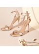 Ankle-strap high heeled sandals in gold metallic leather