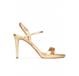 Platform high heel sandals in gold metallic leather Pura López