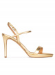 Platform high heel sandals in gold metallic leather