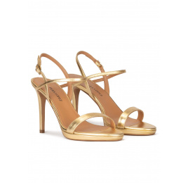 Platform high heel sandals in gold metallic leather Pura López