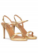Platform high heel sandals in gold metallic leather