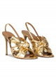 Bow detailed gold high heel sandals in metallic leather