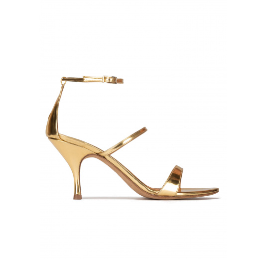 Ankle-strap mid heel sandals in mirrored gold leather Pura López