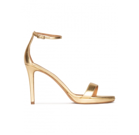 Ankle strap platform high heel sandals in gold leather Pura López