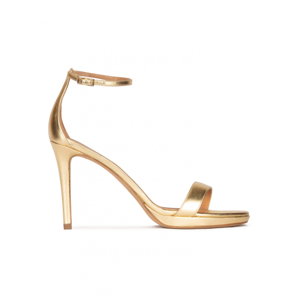 Ankle strap platform high heel sandals in gold leather