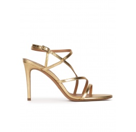 Strappy high heel sandals in gold leather Pura López