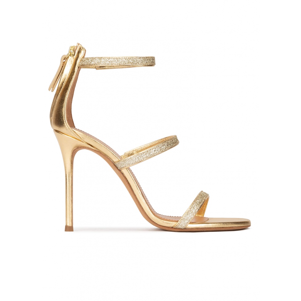 High heel sandals in gold metallic leather and glitter