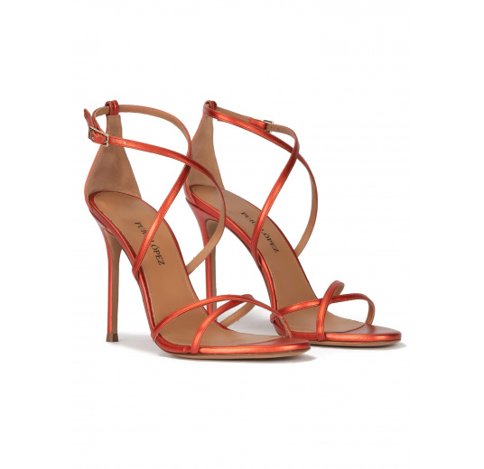 Crossed-strap high heel sandals in coral metallic leather Pura López