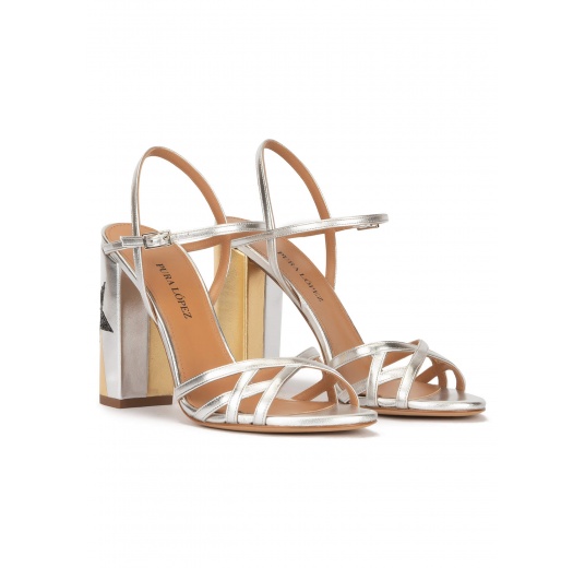 Star detailed high block heel sandals in metallic leather Pura López